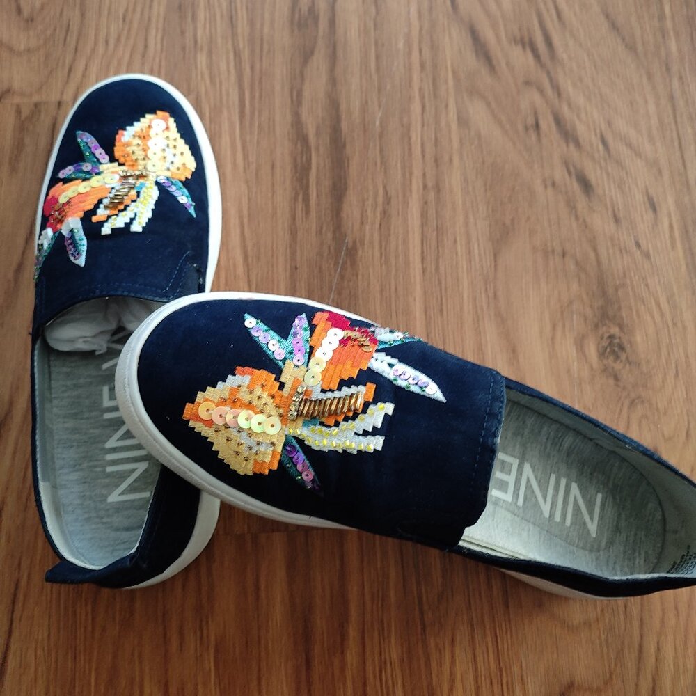 Nine shoes with embroidery work